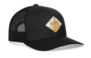 The Haka Hat Horse & Cowboy Trucker Hat | Black Diamond Snapback features a black mesh snapback design with a front patch showing a cowboy on horseback across yellow terrain, framed by a diamond-shaped border.