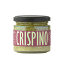 A glass jar with a black lid labeled Famiglia Crispino Artichoke Bruschetta Spread — Marinated Italian Carciofi by Taycte contains a chunky, yellowish-green Calabrian artichoke spread in a purple and light green label.