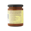 A glass jar with a black lid, adorned with a yellow label detailing nutritional information and ingredients in several languages. Inside is Taycte Famiglia Crispino Calabrese Eggplant Pasta Sauce — Melanzane Sugo by Taycte, a tomato-based sauce featuring Italian tomatoes for an authentic taste of Calabrian cuisine.