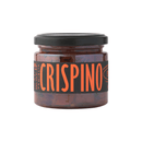 A glass jar with a black lid contains Taycte Famiglia Crispino Explosive Calabrian Hot Chili Peppers - Italian Peperoncini in Extra Virgin Olive Oil, labeled with “CRISPINO” in large orange letters.