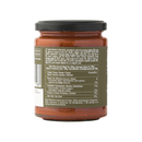 A glass jar of Famiglia Crispino Green Olive Pasta Sauce — Ready-Made Italian Sugo by Taycte with a black lid. The orange-red sauce is visible, and the label lists nutritional info, ingredients, and storage in multiple languages.