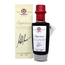 A bottle of Taycte Acetaia Malpighi Saporoso Balsamic Vinegar of Modena—Rich & Savory Italian Condiment—featuring a red cap, stands in front of its cream-colored box, both adorned with decorative labels and signatures that highlight this authentic Modena balsamic vinegar from Taycte.