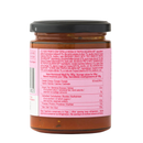 A glass jar of Taycte Famiglia Crispino Tropea Red Onion Pasta Sauce — IGP Certified Italian, featuring a pink label with nutritional information and ingredients for a red sauce made from Calabrian tomato sauce and premium Cipolla Rossa di Tropea IGP. The jar is topped with a black lid, and the multilingual label highlights its high-quality ingredients.