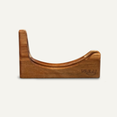 The NULU Knife and Dock Bundle by NULU Inc. features a wooden dock with a curved groove and the word “NULU” engraved on the side, designed for countertop storage to securely hold your NULU knife upright.