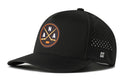 Introducing the Haka Hat Anaheim Hockey Performance 5-Panel Hat | ANA X Flexfit Snapback by Haka Hat. This stylish black snapback features a round logo with crossed hockey sticks, “N” and “A” letters, and a hockey puck. Designed for both comfort and performance, it includes side panel ventilation holes and an H logo—blending breathable comfort with on-trend Anaheim hockey style.
