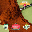 A spoonful of reddish-brown Rico Rico Chile Powder (Ancho) from the 3 Pack Bundle—featuring Ancho, Guajillo, and Arbol varieties—spilled on a green surface, with labels reading Non-GMO, 100% Authentic Products, and Gluten Free; Ancho Powder appears at the top right—a vibrant staple in Mexican cuisine from the Rico Rico brand.
