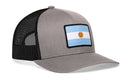 Haka Hat Argentina Flag International Trucker Hat featuring a grey front, black mesh back, and an Argentina flag patch.