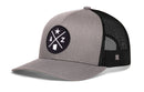 Introducing the Haka Hat Arizona Trucker Hat | AZ X Snapback by Haka Hat—a gray and black mesh trucker hat featuring a structured crown, curved brim, and an adjustable classic snapback closure. The front showcases a round patch with a star, the letters “A” and “Z,” and a state outline graphic.