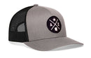 Introducing the Haka Hat Arizona Trucker Hat | AZ X Snapback by Haka Hat—a gray trucker hat featuring a black mesh back and a circular patch on the front displaying a star, the letters “A” and “Z,” and an outline of Arizona. Designed for everyday wear, this ultimate Arizona trucker hat includes an adjustable snapback closure for a comfortable fit.