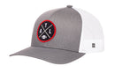 Introducing the Haka Hat Atlanta Trucker Hat | Black ATL X Football Snapback by Haka Hat—a gray and white mesh trucker hat with a round black and red patch featuring crossed lines, the letters A, T, L, and a small football at the center. This Atlanta trucker hat is perfect for showcasing your ATL football style.