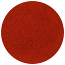 A circular mound of finely ground red powder, viewed from above, on a white background—The Spice Lab Organic Spanish Sweet Paprika is perfect for adding vibrant color and rich flavor to your favorite BBQ rubs.