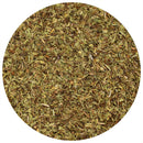 A circular close-up image showcases The Spice Lab Savory Whole Leaf 1 lb by The Spice Lab, featuring chopped green herbs with small leafy and stem pieces—ideal for foodservice or BBQ seasoning—seen from above against a white background.