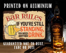 Bar Rules - Metal Sign by Lone Star Art: “If you’re still standing, you need another drink.” Features beer mug, whiskey bottle & glass. Printed on aluminium—won’t rust, fade, or peel. Perfect funny bar decor!.