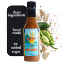 A bottle of Culture Hot Sauce Bar Sauce by Culture Hot Sauce, crafted with sliced jalapeños, garlic cloves, and flavorful spices. This savory garlic sauce is handmade for those who appreciate clean ingredients and no added sugar, delivering bold flavor as both a condiment and a flavor enhancer.
