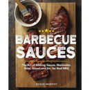 Barbecue Sauces: The Art of Making Sauces, Marinades, Rubs, Glazes and Etc. for Real BBQ - Paperback by Roger Murphy from Books by splitShops features mouthwatering grilled ribs, a bowl of sauce, and a brush on a wooden board. Discover flavorful BBQ sauces and barbecue rubs to elevate your grilling experience with this comprehensive cookbook.