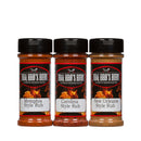 Three BBQ Bros Rubs Southern Style BBQ Rub Gift Set bottles—Memphis Style, Carolina Style, and New Orleans Style—each with black lids and fiery labels, are lined up side by side against a white background. This irresistible 3-pack from BBQ Bros Rubs is the perfect way to bring authentic Southern style BBQ rub flavors home.
