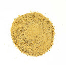 Round pile of ground pepper on a white background