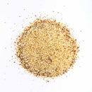 Round pile of mixed spice on a white background