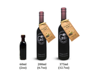 Three bottles of Georgetown Olive Oil Co. Blackberry Ginger Balsamic Vinegar in 60ml, 200ml, and 375ml sizes, each clearly labeled with its respective volume; the two larger bottles include tags adorned with ginger and blackberry illustrations. Produced by Georgetown Olive Oil Co. in Modena, Italy, this aged balsamic vinegar offers a distinctive flavor profile that harmoniously blends rich blackberries with zesty ginger for a one-of-a-kind tasting experience.