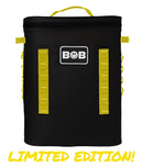 A Bob - The Cooler Co. 25L "The Bro" Backpack Soft Cooler in black and yellow, featuring a handle and the BOB logo, is displayed with “LIMITED EDITION!” in bold yellow text at the bottom. This durable cooler backpack includes an airtight lid to keep your items fresh and secure.