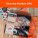 A Braize Large Stainless Steel Grill Basket with Removable Handle, Basting Brush & Scrub Sponge sits on orange tissue paper by a Father’s Day card under a “Give the Perfect Gift!” banner—perfect for grilling fish and veggies.