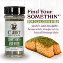 A bottle of B.T. Leigh’s Zesty Dill Lemongrass Seasoning sits next to a piece of cooked salmon coated in green herbs, with text describing the ingredients.