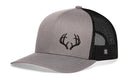 Introducing the Haka Hat Buck Antler Trucker Hat by Haka Hat—a black snapback featuring an embroidered buck antler design on the front panel. This outdoor trucker hat combines rugged style with breathable mesh, making it the perfect choice for all your adventures.