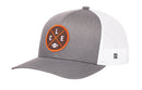 The Haka Hat Cleveland Trucker Hat features a black CLE X football snapback design with a breathable mesh back, combining style and comfort.