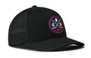 The Haka Hat Columbus Hockey Performance 5-Panel Hat | CBS X Flexfit Snapback features a black design with a round patch depicting two crossed hockey sticks, a puck, and the letters B, C, and S. Crafted by Haka Hat as a Columbus Hockey cap, it offers small ventilation holes on the side and a comfortable Flexfit sweatband for lasting all-day comfort.