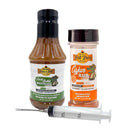 Showcasing three premium BBQ essentials—a bottle of Fat Boy Creole Butter Marinade, a shaker of Cajun Rub, and a poultry injector syringe—the Hickman's BBQ Fat Boy Turkey and Poultry Package with Injector offers everything you need for a flavorful feast. All items are displayed upright against a clean white background, highlighting Hickman's BBQ signature Cajun marinade collection.