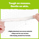 A close-up shows two hands wringing out a soaked Crocodile Cloth® Grill Wipe with water dripping. Text: Tough on messes. Gentle on skin. Crocodile Cloth Grill Wipes (80 Count) are alcohol-free, highly absorbent, and perfect for heavy-duty BBQ cleaning.