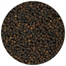 A close-up view of whole Tellicherry peppercorns from The Spice Lab Premium Black Pepper Grinder by The Spice Lab, densely packed together and filling the entire circular frame—perfect for use in your favorite black pepper grinder.