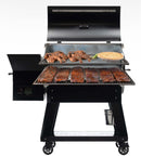 A Recteq Deck Boss 590 with a Pimp My Grill® Gen2 Slide-Out Rack System - 2 Racks, featuring ribs on the bottom rack and chicken pieces and a pie on the top rack.