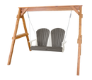 The Kanyon Living Poly Lumber 4′ Adirondack Swing Deluxe in Driftwood Grey and White features a sturdy wooden frame with two seats, dark gray slatted surfaces, white armrests, and hanging chains. The background is plain white.