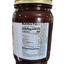 A close-up of a jar showing the nutrition facts label for DDR BBQ Supply Bacon Bourbon BBQ Sauce – 16 oz by DDR BBQ Supply. The serving size is 2 tablespoons (28g) with 60 calories per serving. Nutritional details are listed on the label.