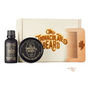 DDR BBQ Supply grooming set featuring an Immaculate Beard wooden comb, beard oil, and beard balm in a branded box.
