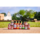 DDR BBQ Supply Brushfire Farms The Texas Spread collection featuring ten assorted pepper jams, BBQ sauces, and syrups.