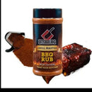 DDR BBQ Supply Butcher BBQ Grill Master rub in a plastic shaker bottle with a pile of seasoning and cooked meat.