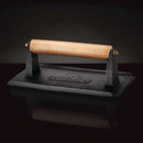 DDR BBQ Supply Napoleon cast iron chef's press with a wooden handle for even searing on grills and griddles.