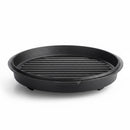 The Napoleon Cast Iron Dutch Oven (56059) by Napoleon Grills is a round black cast iron pot with two small handles, ideal for BBQ cooking, shown on a white background.