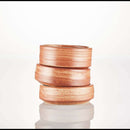 DDR BBQ Supply handmade ceramic shave bowls stacked vertically, featuring a rustic brown textured finish.