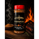 DDR BBQ Supply Scott's Smoked Q Chesapeake dry rub bottle with smoky background, grilled meat, and spice pile.