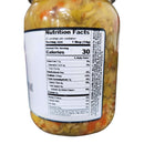 A close-up of a DDR BBQ Supply Crushed Olive Spread Pint – 16 oz jar shows its nutrition label: 32 servings per container, 1 tbsp (14g) per serving, and 30 calories each. Chopped vegetables inside add to its Mediterranean appeal.