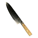 DDR BBQ Supply Spaceman Knives 8-inch chef knife with a 67-layer Damascus steel blade and olive wood handle.