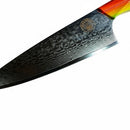A close-up of the Spaceman Knives EM Wave Chef Knife, featuring a Damascus steel blade and multicolored handle, photographed against a white background—ideal for any professional kitchen.