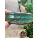 DDR BBQ Supply handmade green ceramic shave bowl with a rustic glazed finish for holding soap pucks.