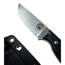 A close-up of the Spaceman Knives Halimede Fixed Blade Knife shows its textured, stonewashed D2 steel blade and black Micarta handle, with the Spaceman Knives logo visible next to a black sheath with metal rivets.