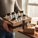 DDR BBQ Supply Hardcore Carnivore BBQ Rub Sampler Set featuring six different seasonings in bottles.