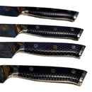 DDR BBQ Supply Spaceman Knives Interstellar steak knife set with blue honeycomb handles on a marble surface