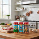 The Meat Church Southern Sweet Smoke Pack features three BBQ rubs with vibrant labels, displayed on a kitchen counter near raw steaks, spices, and fresh veggies—ideal for adding sweet BBQ flavor to your next backyard smoking session.